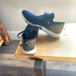 New Balance black and leopard tennis shoes, size 7.5! Worn maybe twice inside
